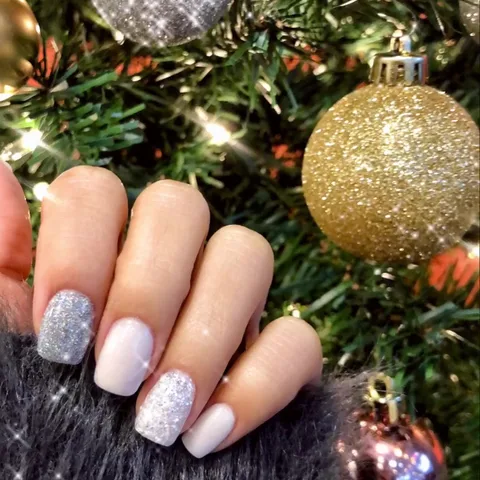 A soft pink set of nails finished at Sylvia’s Nail Salon